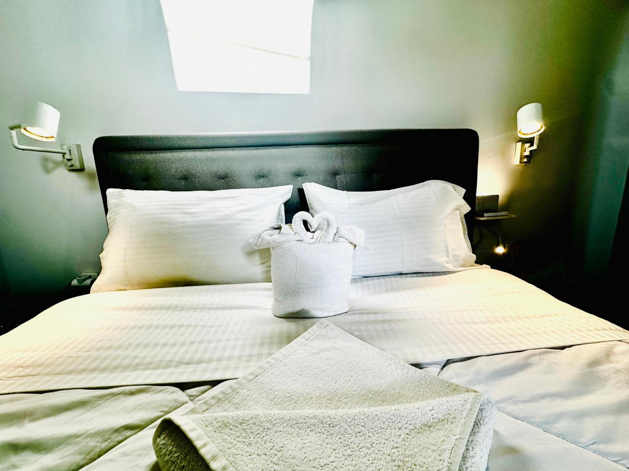 Travelers Luxury Suites, & *